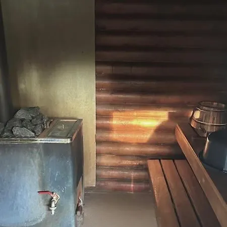 Hirsimoekki,meri,sauna,terassi シャレー